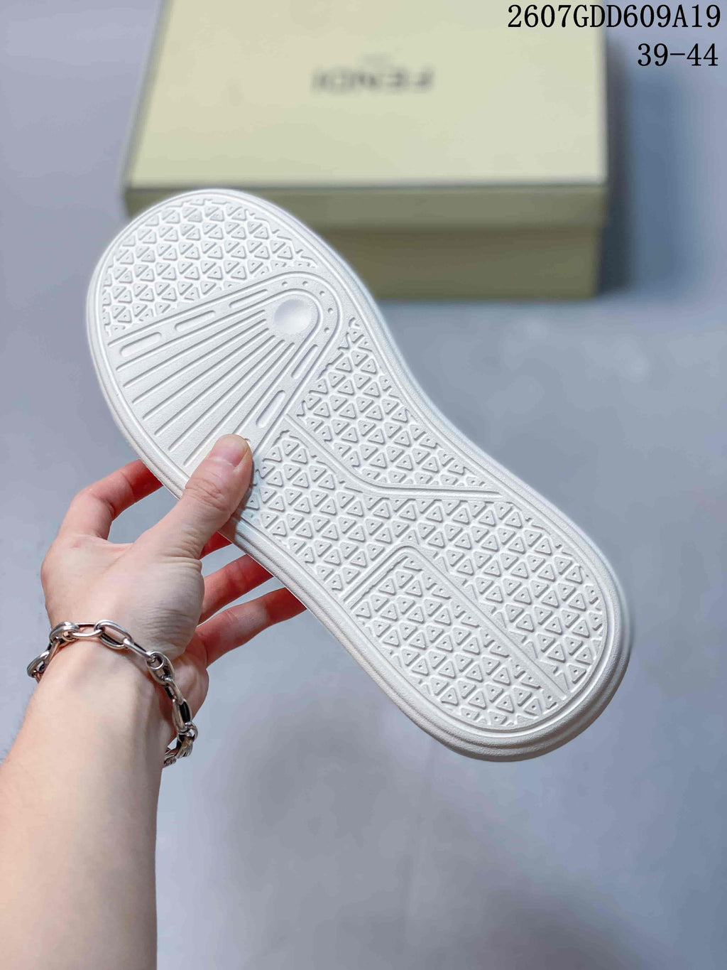 Fendi GDD609A19 Slip-On Sneakers in Taupe and White - product image from the listing.