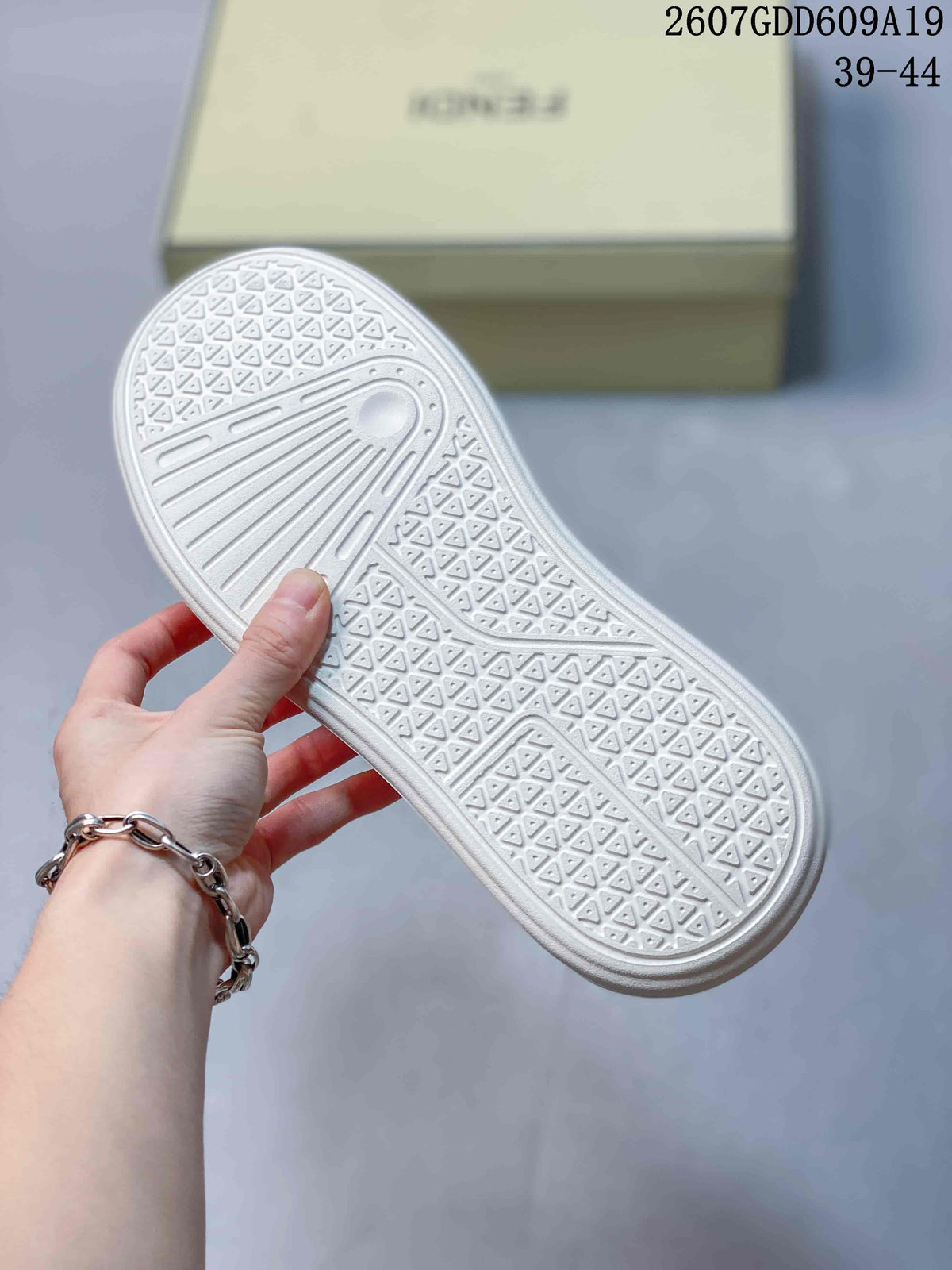 Fendi GDD609A19 Slip-On Sneakers in Taupe and White - product image from the listing.