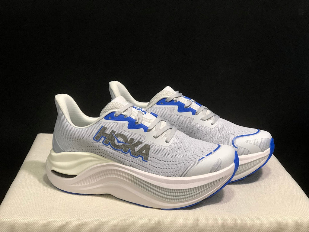 White and Blue HOKA Skyward X Running Shoes - product image from the listing.