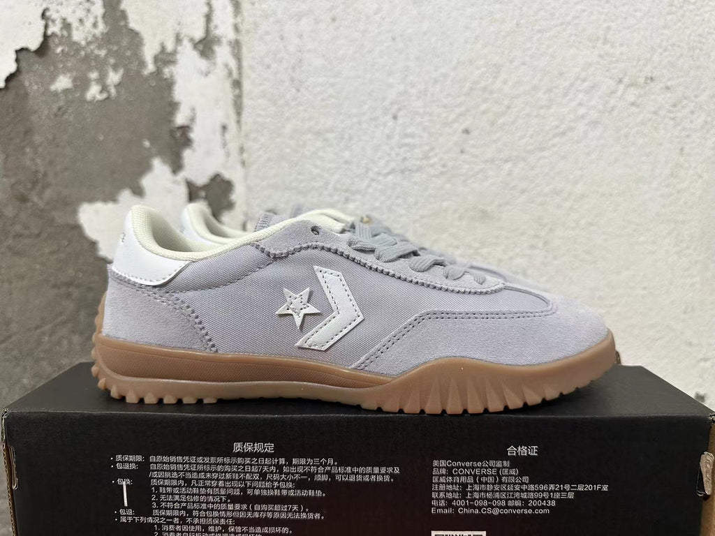 Gray and Gum Converse Trainer-Style Sneakers - product image from the listing.