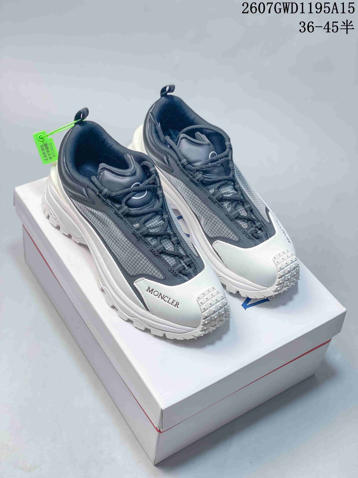 Moncler Trailgrip Lite2 Sneakers in White Black 2607GWD1195A15 - product image from the listing.