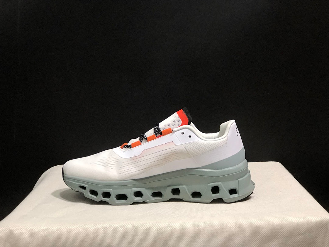 White and Blue On Cloudmonster Sneakers - product image from the listing.
