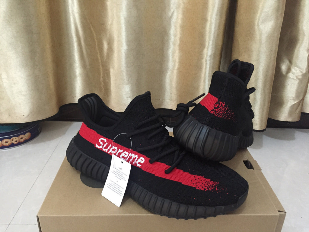 Yeezy 350 V2 Sneakers in Black and Red Knit - product image from the listing.