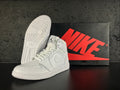 Jordan 1 Retro High OG High-Top Sneakers in White - product image from the listing.