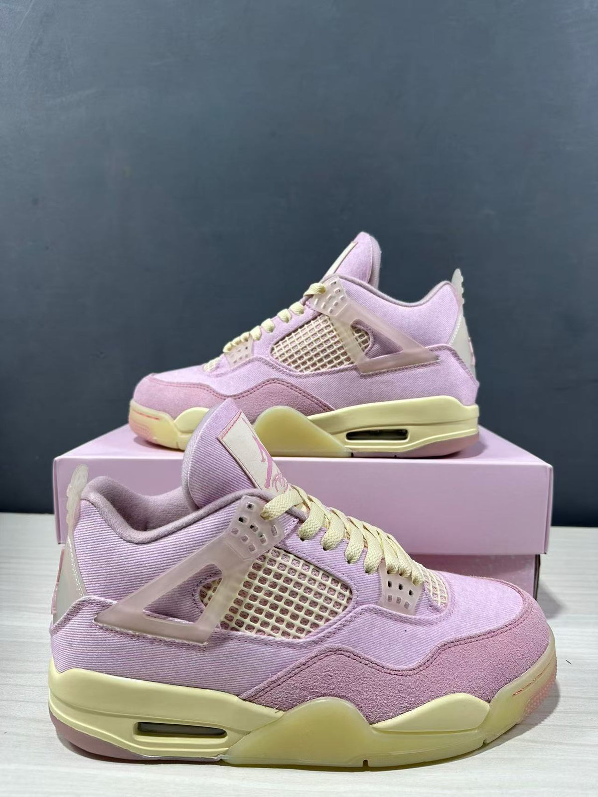 Air Jordan 4 Retro Pink Sneakers IB6716-600 - product image from the listing.
