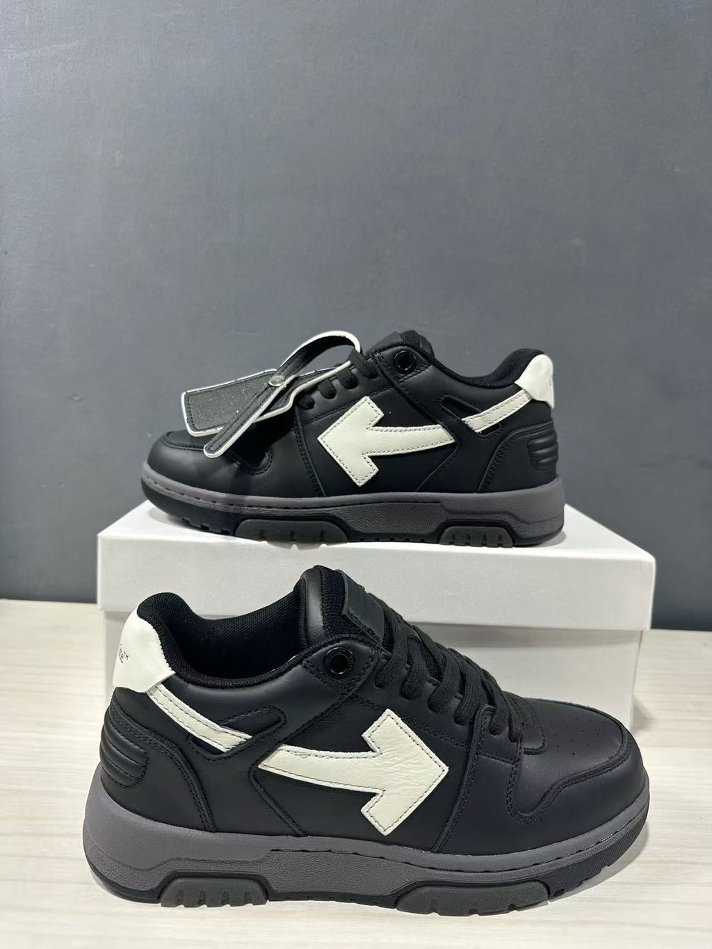 Off-White Out Of Office Low-Top Sneakers in Black White OWIA189C99LEA0061001 - product image from the listing.