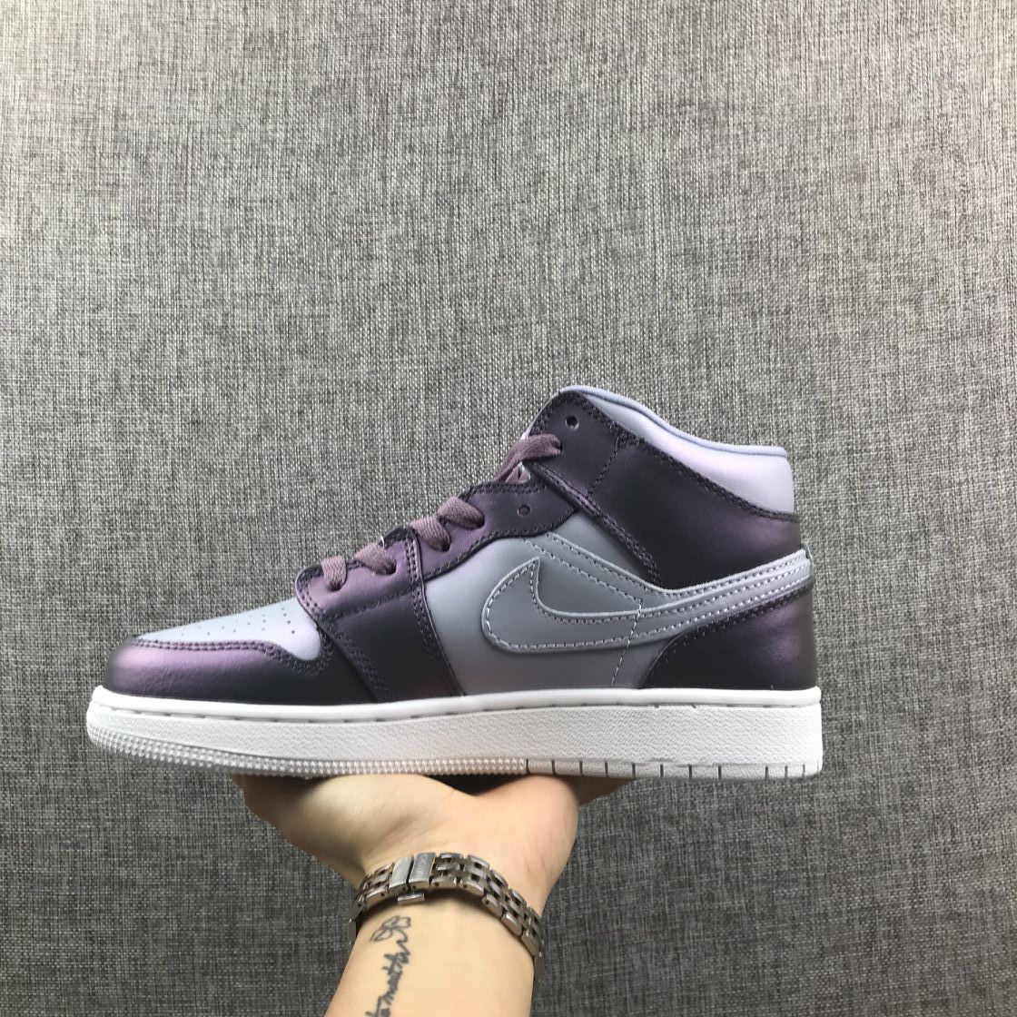 Jordan 1 Mid Sneakers in Purple AV5174-400 - product image from the listing.