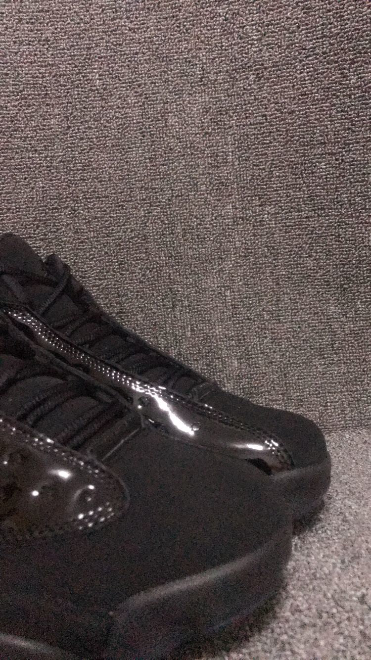 Air Jordan 13 Retro Cap and Gown Sneakers in Black - product image from the listing.
