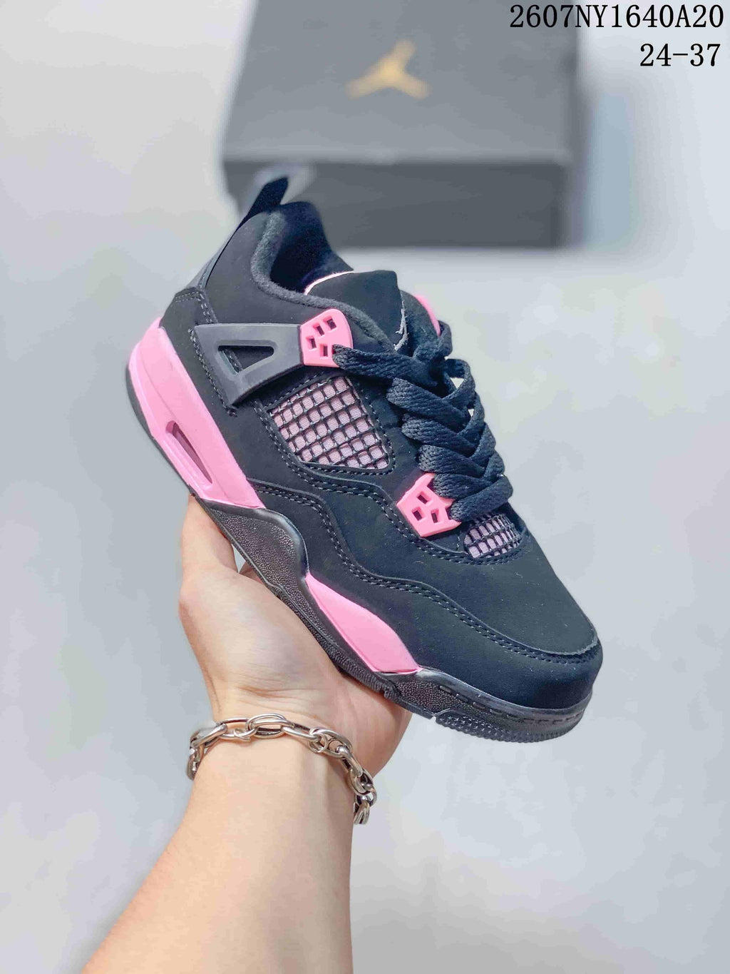 Jordan Panda Low-Top Kids Basketball Sneakers in Black Pink - product image from the listing.