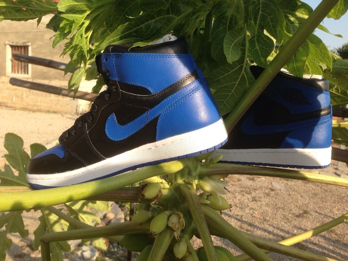 Jordan 1 High Basketball Sneakers in Blue and Black - product image from the listing.