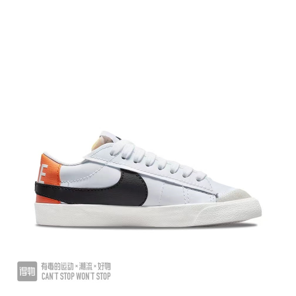 Nike Blazer Low 07 Sneakers in White Orange Black - product image from the listing.