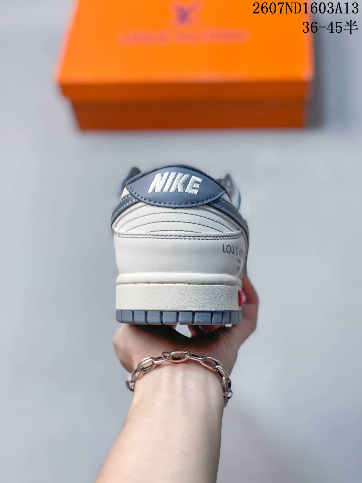 Nike SB Dunk Low LV Print Sneakers in White Grey 2607ND1603A13 - product image from the listing.