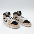 Jordan 1 Low BQ6472-800 Sneakers in Tan and Black - product image from the listing.