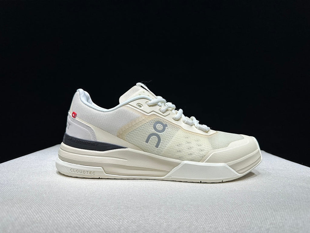 Cream and Black On The Roger Advantage Pro Sneakers - product image from the listing.