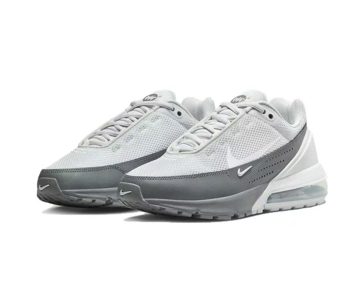 Nike Air Max 2090 Sneakers in White and Dark Grey - product image from the listing.