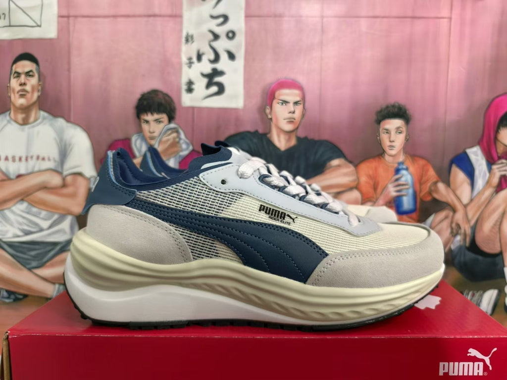 White and Navy PUMA Rider Elite Sneakers - product image from the listing.