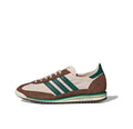 Green and Brown adidas JH8648 Retro Running Sneakers - product image from the listing.