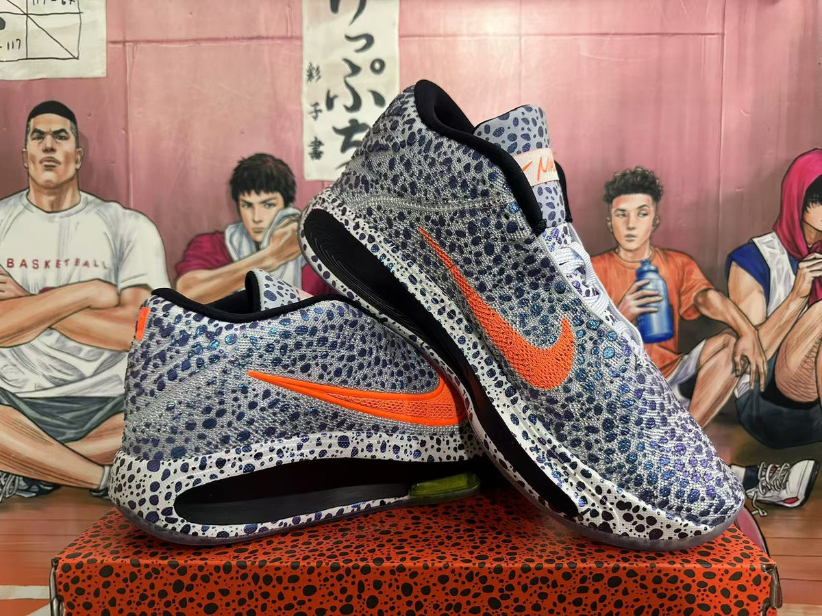 Nike Basketball Footwear, Gray and Orange Speckled Design - product image from the listing.