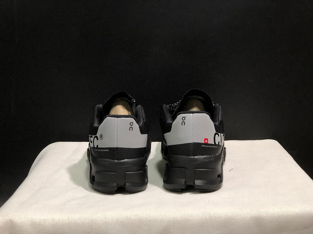 Black and Silver On Cloud X Sneakers - product image from the listing.