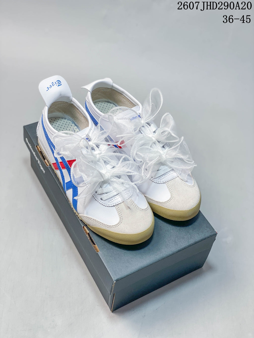 Onitsuka Tiger MEXICO 66 SD Sneakers in White Blue Red - product image from the listing.