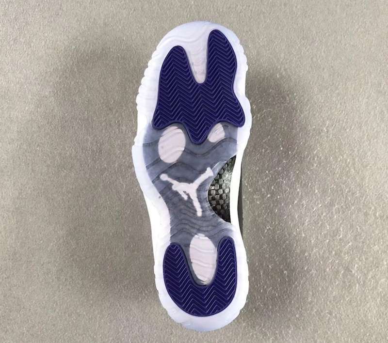 Air Jordan 11 Concord Black White Sneakers - product image from the listing.