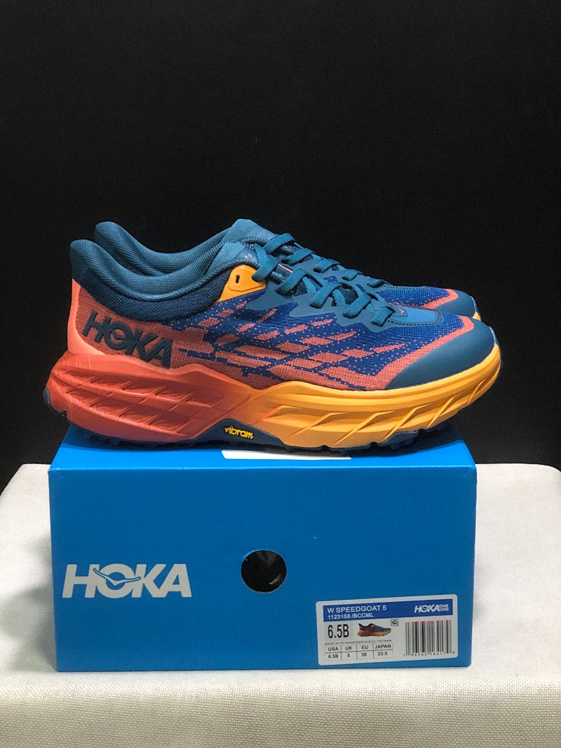 HOKA Speedgoat 5 Trail Running Shoes, in Blue and Orange - product image from the listing.