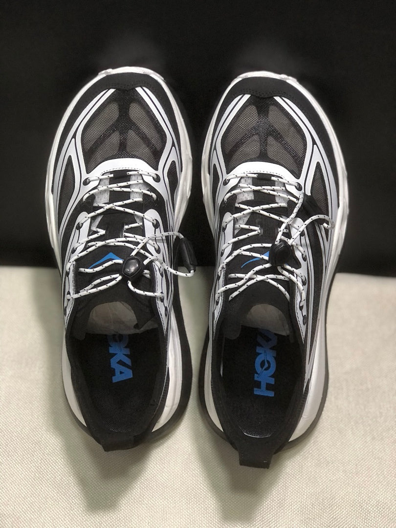 HOKA Stinson One 7 Black and White Trail Trainers - product image from the listing.