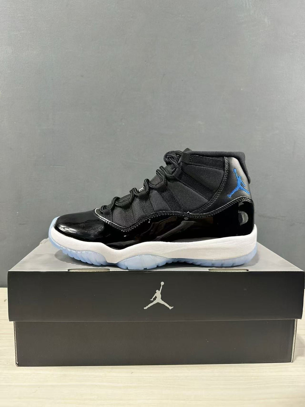 Air Jordan 11 Retro High Black Blue Sneakers CT8012-900 - product image from the listing.