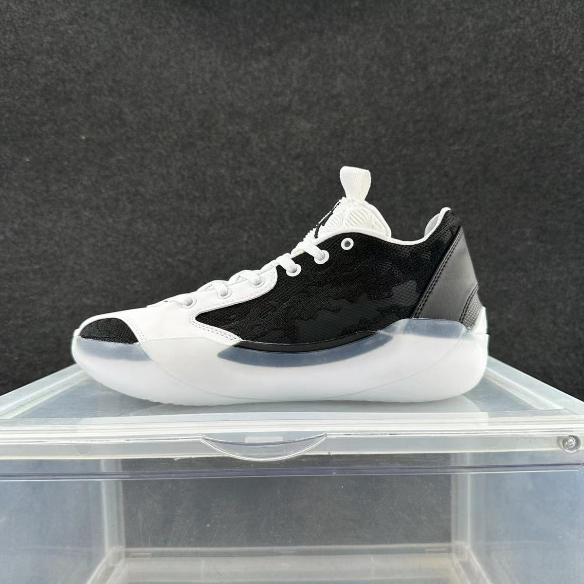 Jordan 39 Basketball Shoes in Black and White - product image from the listing.