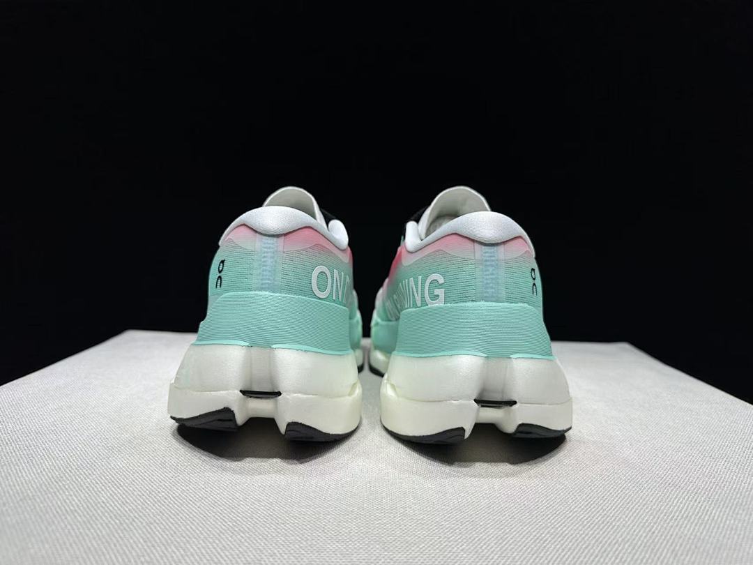 On Cloudboom Max Running Shoes, in White Mint Pink - product image from the listing.