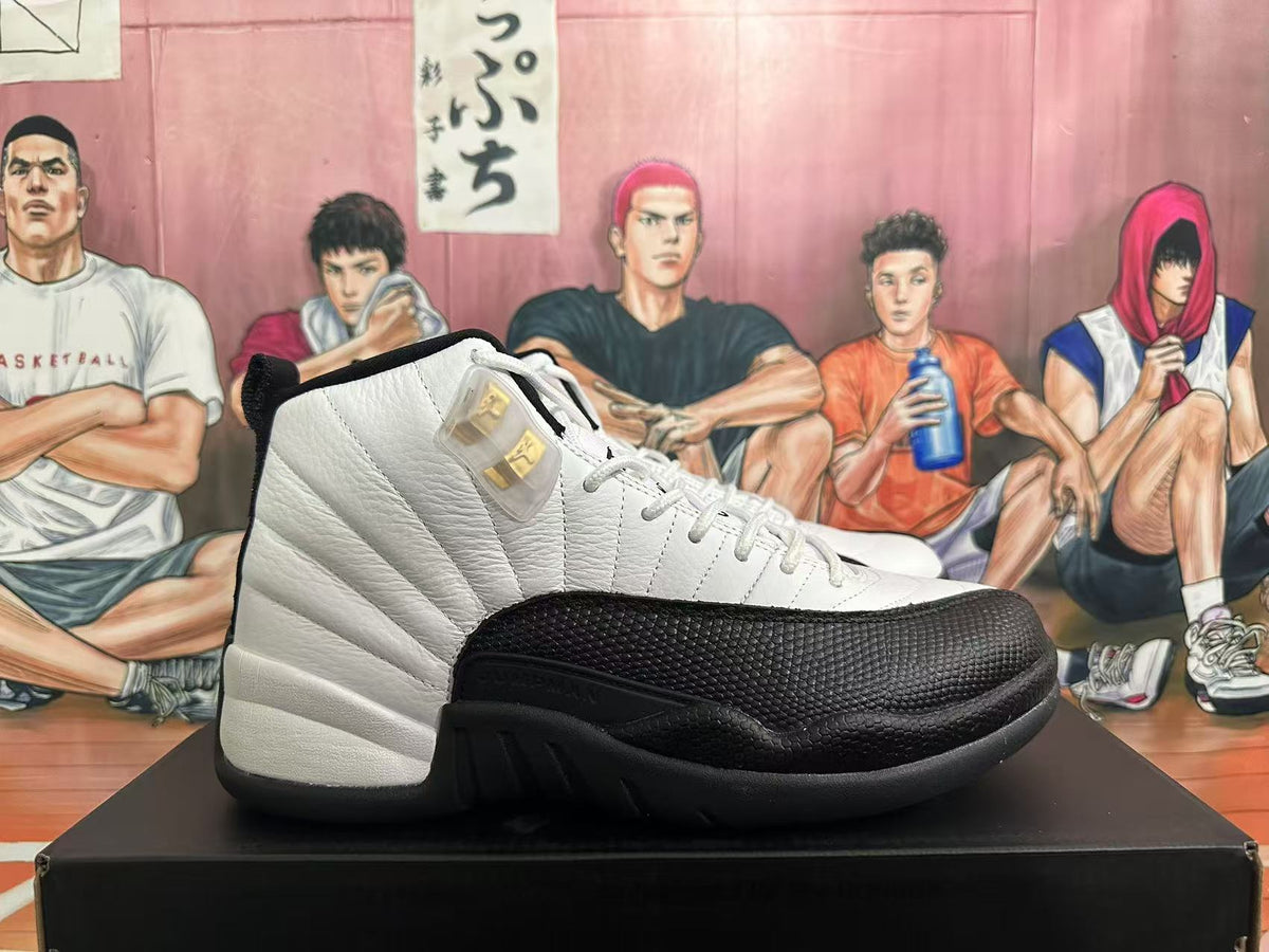 Jordan 12 Taxi Sneakers in White and Black - product image from the listing.