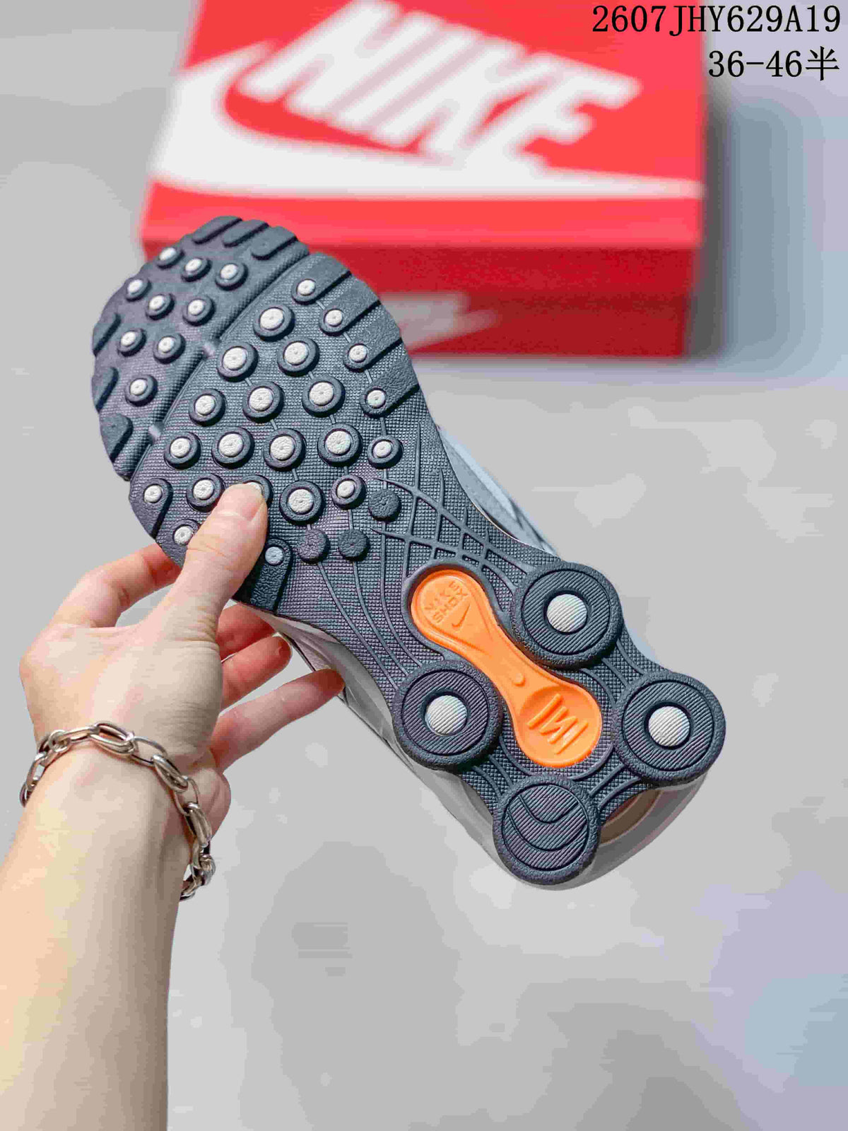 Nike Shox Ride 2 Sneakers in Grey White Orange 711395WPR - product image from the listing.