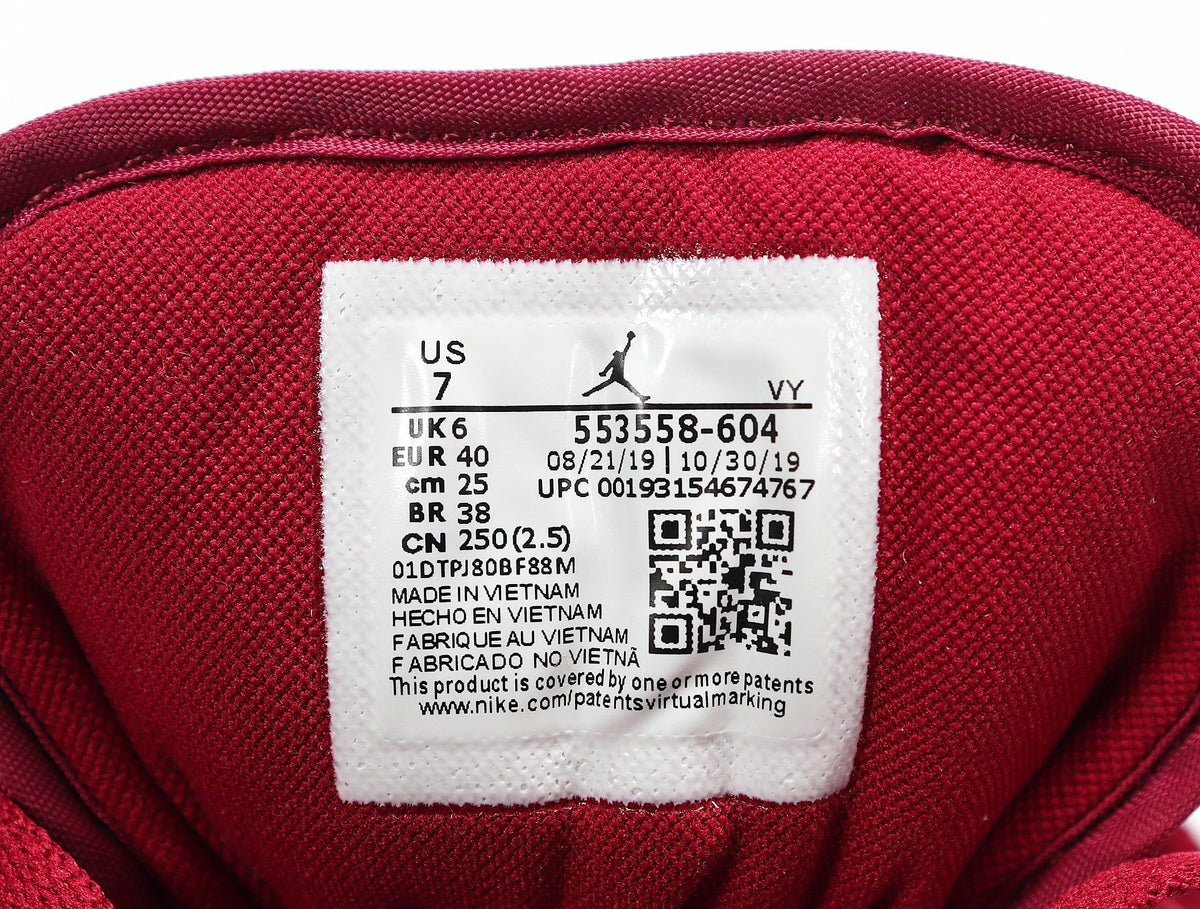Jordan 1 Low White and Rose Sneakers in Red 553558-604 - product image from the listing.