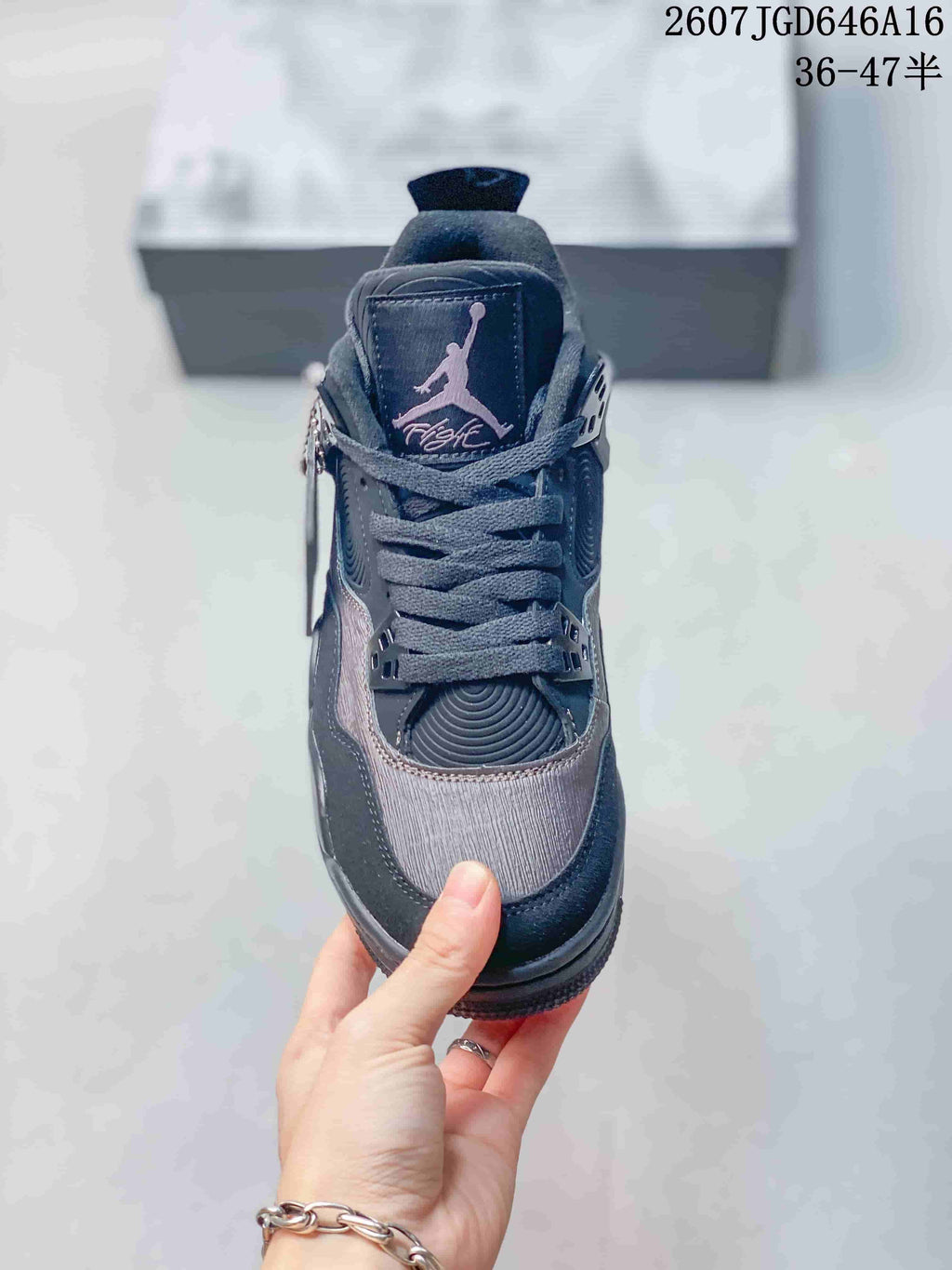 Air Jordan 4 Retro Sneakers Charcoal Black JA8136 - product image from the listing.