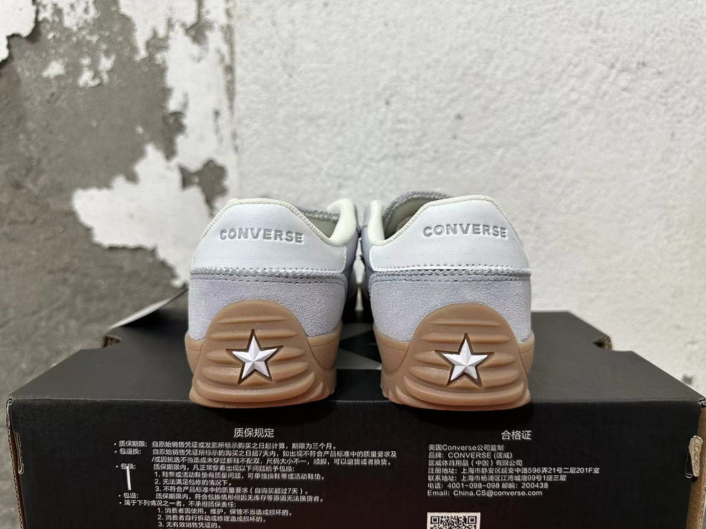 Gray and Gum Converse Trainer-Style Sneakers - product image from the listing.