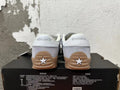 Gray and Gum Converse Trainer-Style Sneakers - product image from the listing.