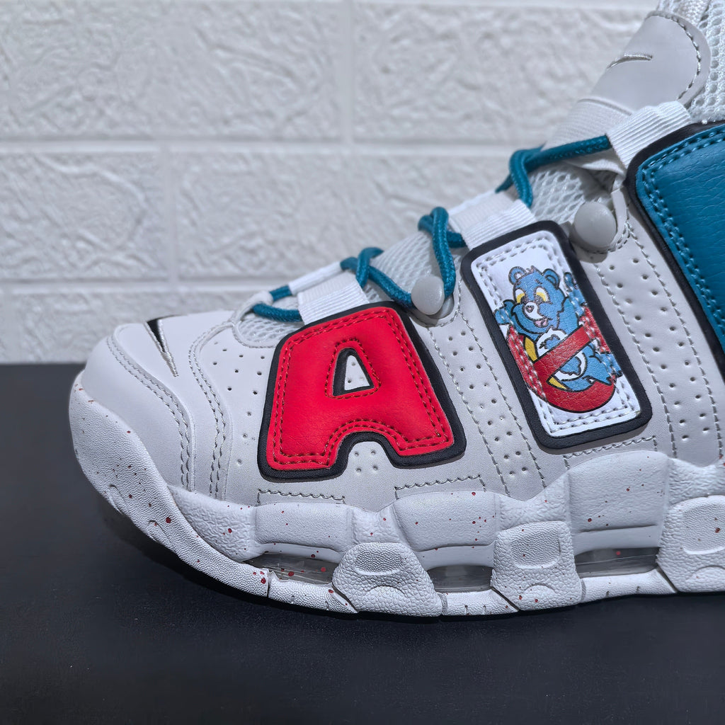 Nike Air More Uptempo Cartoon Bear Sneakers, in White Blue Red - product image from the listing.