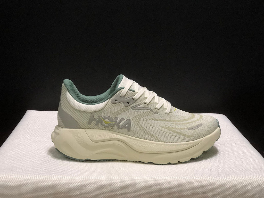 HOKA Arahi 8 Shoes for Running in Cream and Sage - product image from the listing.