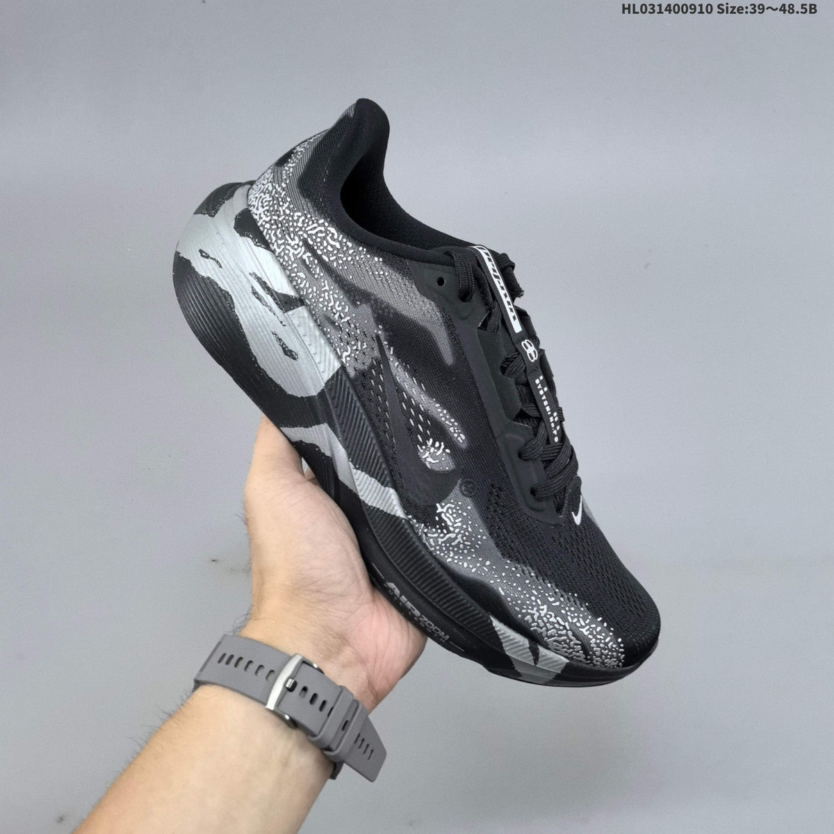 Nike Air Zoom Pegasus 42 Running Shoes, in Black and Silver - product image from the listing.