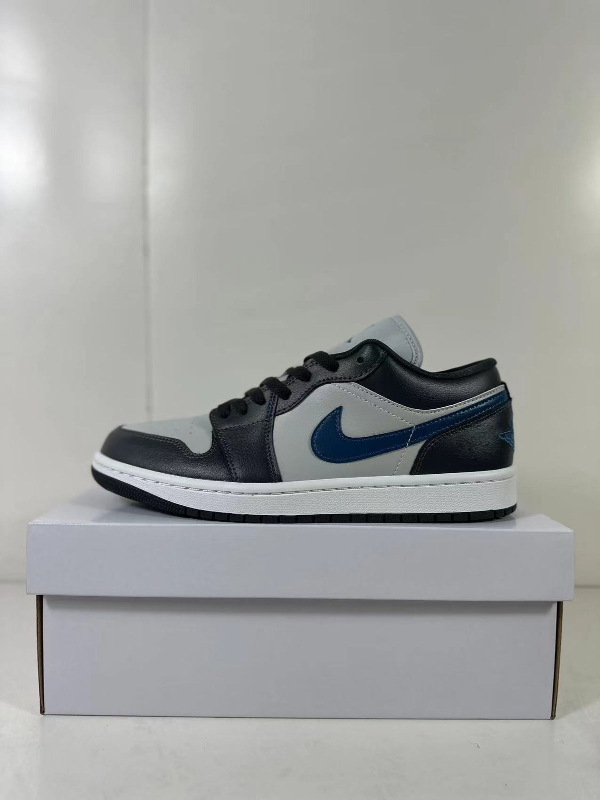 Air Jordan 1 Low Black Grey Blue DC0774-040 - product image from the listing.