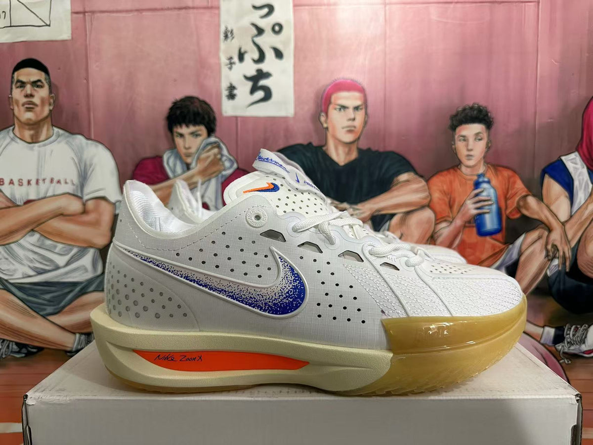 Nike ZoomX Basketball Sneakers in White Blue Orange - product image from the listing.
