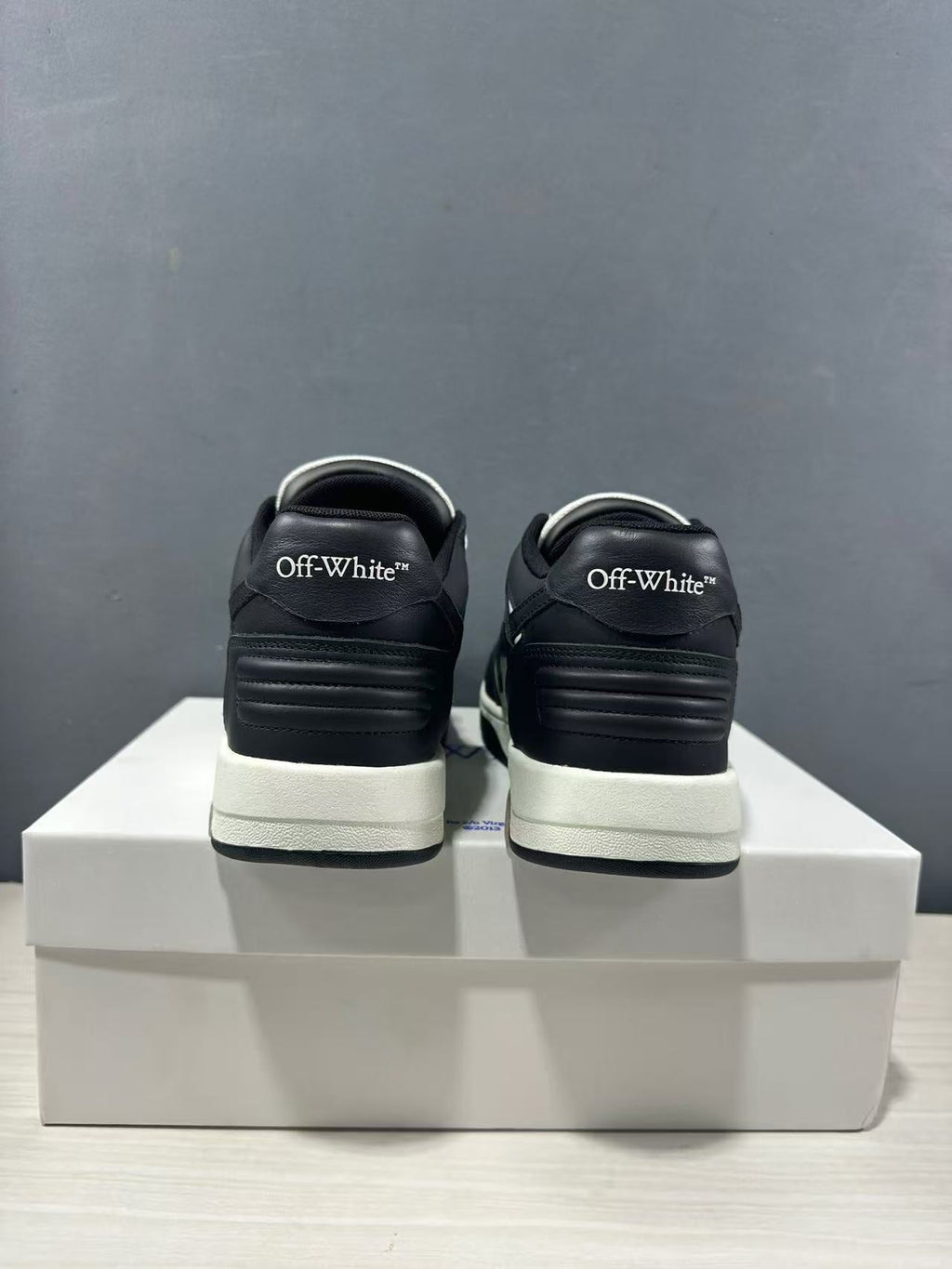 Off-White Out Of Office Low-Top Sneakers in Black White OMAI89C99LEA0070110 - product image from the listing.