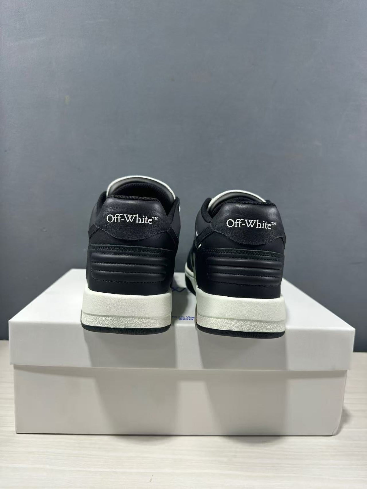 Off-White Out Of Office Low-Top Sneakers in Black White OMAI89C99LEA0070110 - product image from the listing.