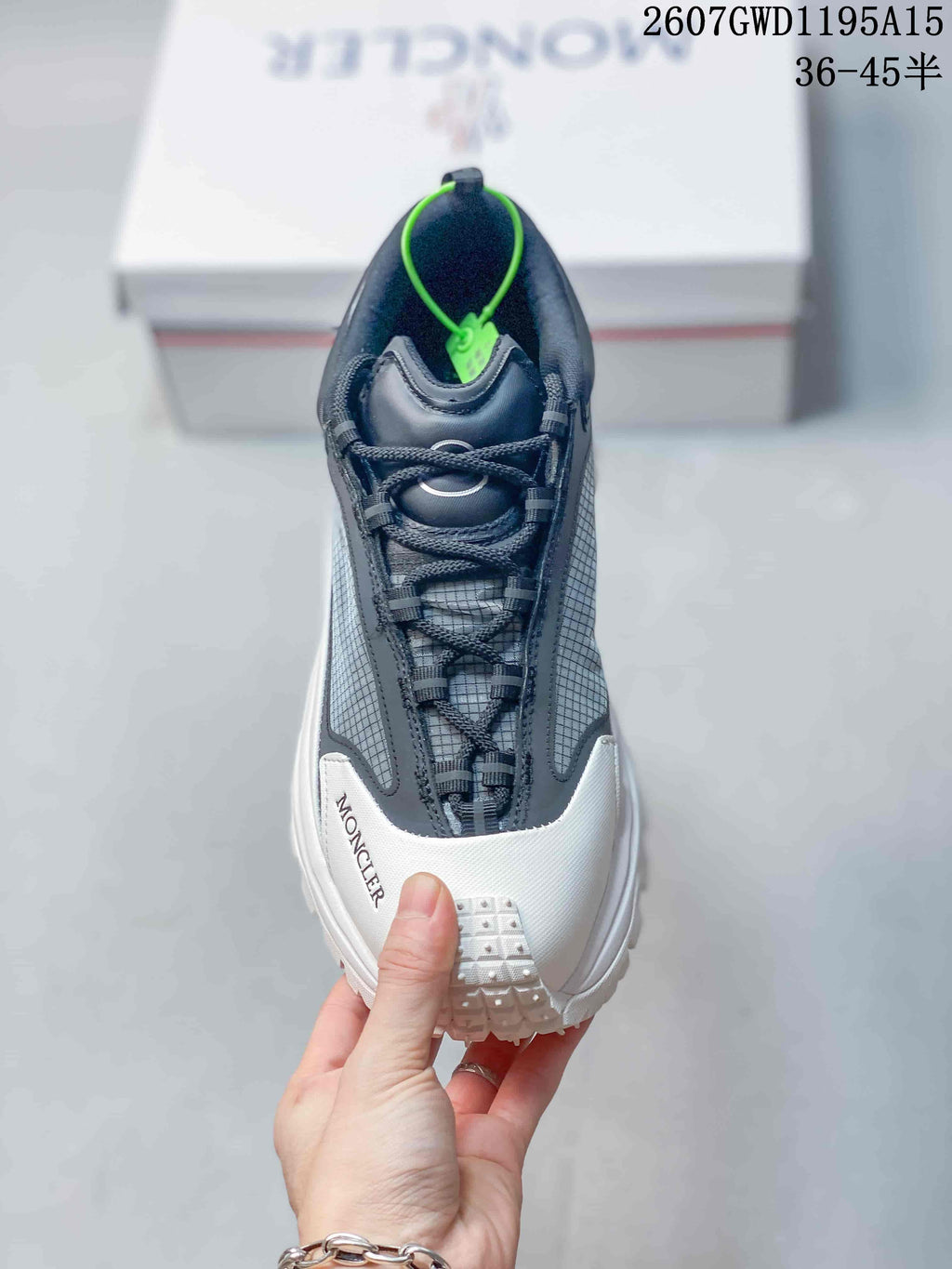 Moncler Trailgrip Lite2 Sneakers in White Black 2607GWD1195A15 - product image from the listing.
