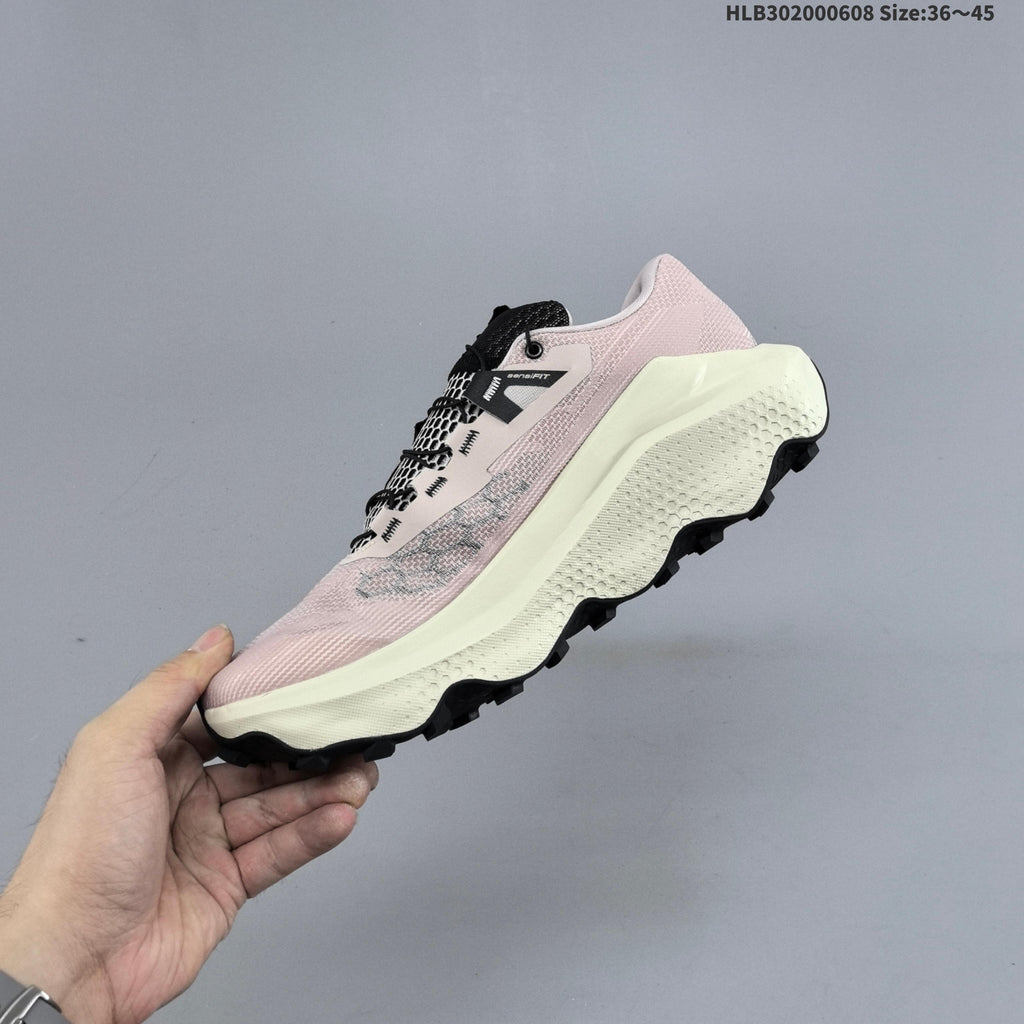 Salomon Ultra Glide 4 Trail Running Shoes, in Pink and Cream - product image from the listing.