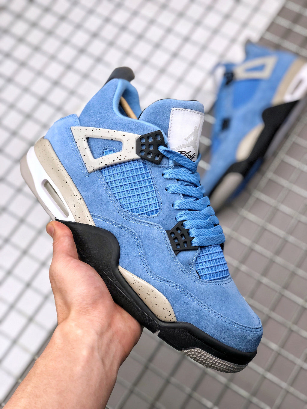 Air Jordan 4 University Blue Sneakers CT8527-400 - product image from the listing.