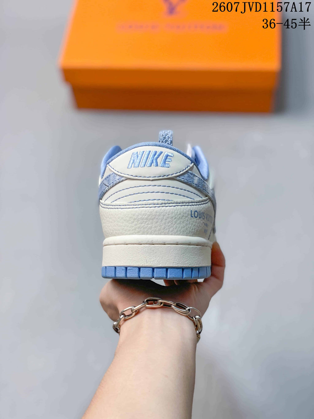 Nike Dunk Low Louis Vuitton Sneakers in Ice Blue Denim 2607JVD1157A17 - product image from the listing.