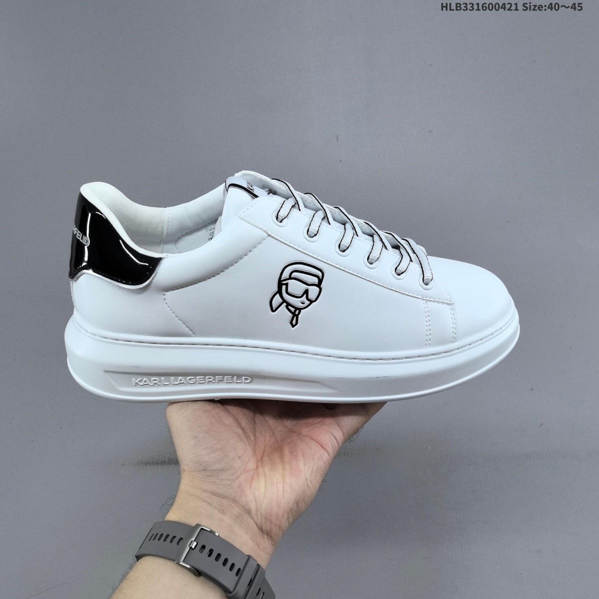 Karl Lagerfeld White Low-Cut Sneakers with Logo Detail - product image from the listing.