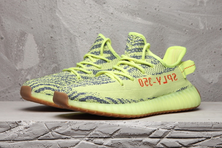 Lime Green and Brown Adidas Yeezy Boost 350 V2 Sneaker - product image from the listing.