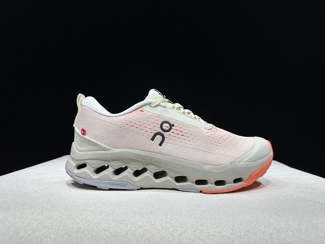 On Cloudsurfer Trail 2 Trail Running Shoes, in Ivory and Coral - product image from the listing.